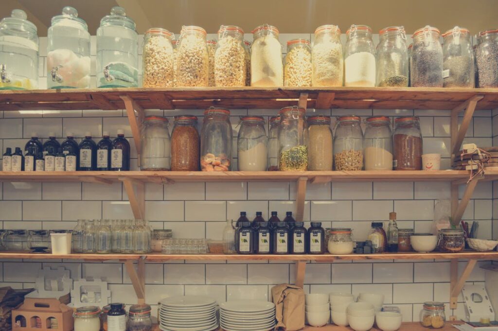 Kitchen shelves neatly arranged and categorised