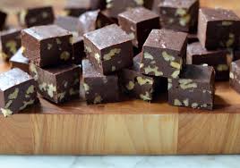 Image of chocolate fudge pieces kept on a wood tray