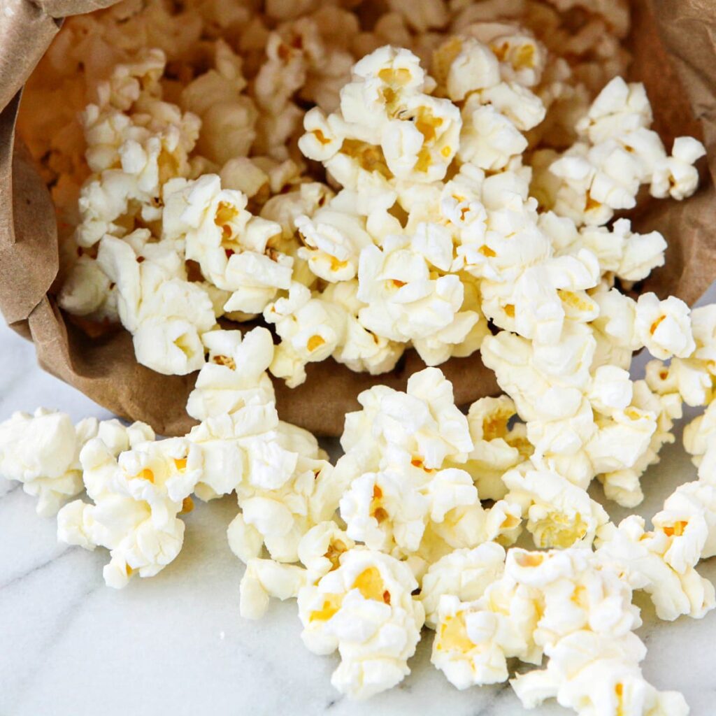 Top 10 Snacks Under 10 mins - Image of popcorn kept in a brown paper bag